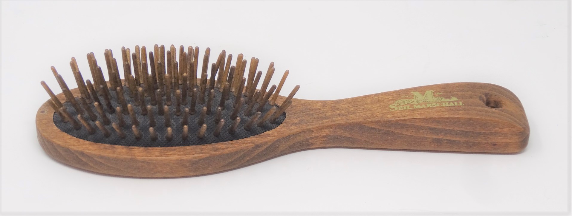 Hairbrush with wooden pins brown
